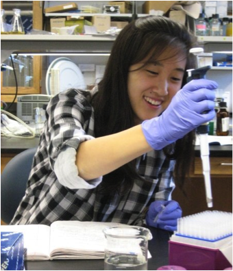 A portrait of the author in a lab.