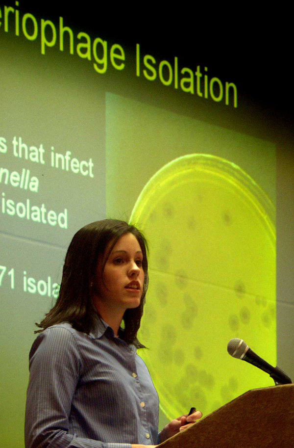 a woman giving a presentation