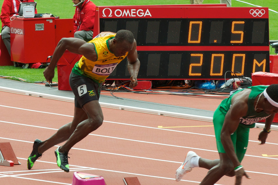 Runner Usain Bolt beginning a race