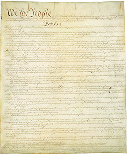 The first page of the U.S. Constitution is shown.