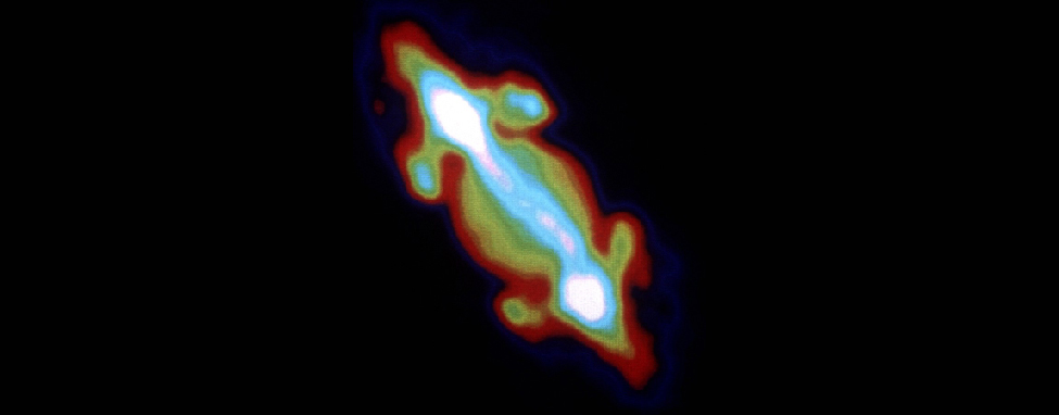 Radio Emission from Jupiter. Jupiter does not appear spherical in radio light, but more like a football surrounded by bright, curved lobes and a bright, extended equatorial region.