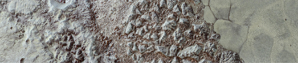 An image of a strip of Pluto’s terrain, showing an area with a few craters on the left, mountains in the center, and a flat “sea” on the right.